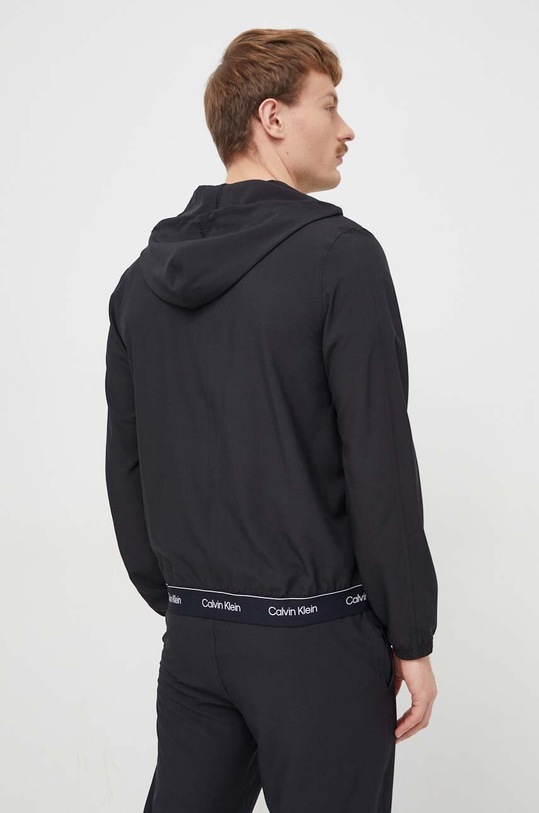 Odzież Calvin Klein Performance wiatrówka 00GMS4O525 czarny