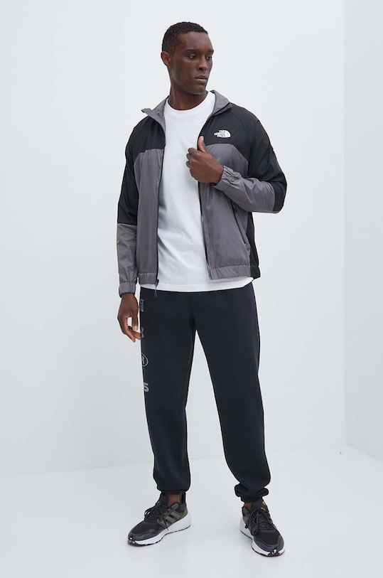 Μπουφάν The North Face Wind Shell Full Zip NF0A879FRPI1 γκρί SS24