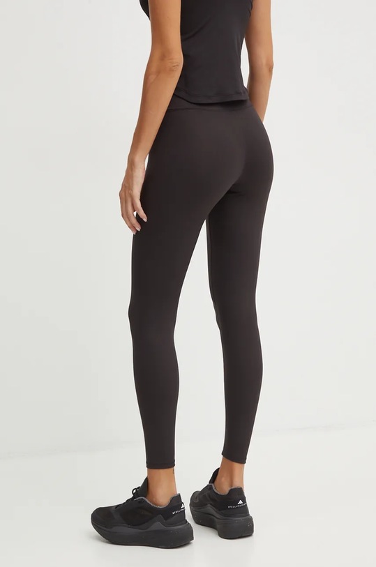 Puma legginsy do jogi STUDIO FOUNDATION czarny 524847