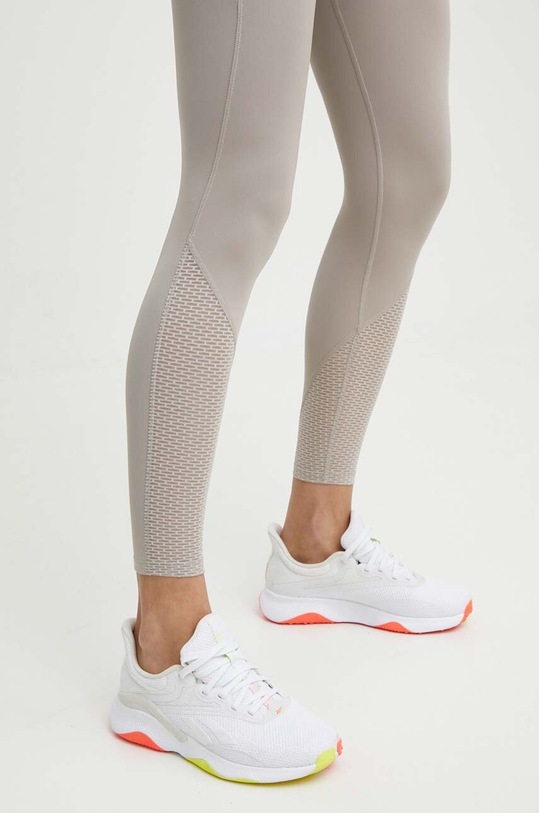 Reebok legginsy do biegania beżowy 100076060