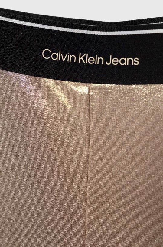 Dziewczynka Calvin Klein Jeans legginsy dziecięce IG0IG02403.128.176.PPYH złoty