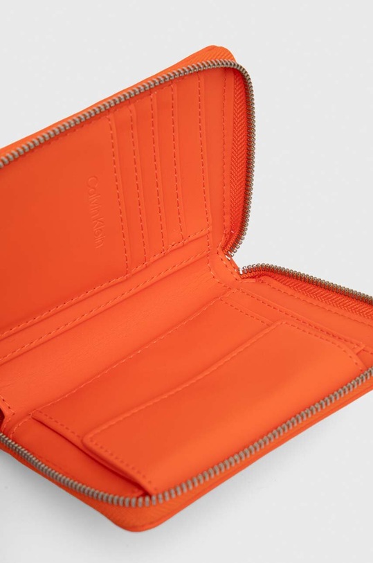 Peňaženka Calvin Klein K60K611387 oranžová