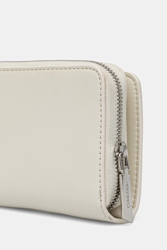 Гаманець Calvin Klein K60K611937 бежевий SS25