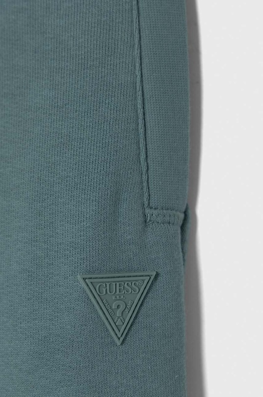 Dječaci Dječji donji dio trenirke Guess L2YQ46.KAIJ1.PPYH tirkizna