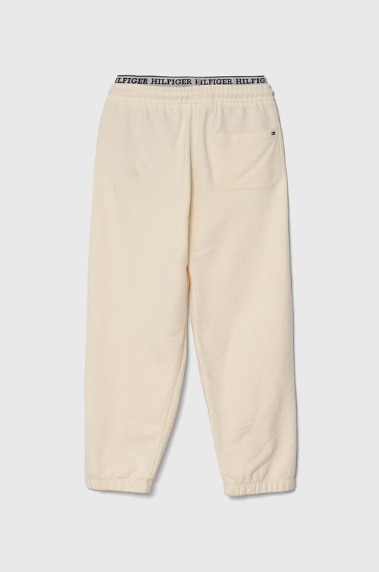 Dětské bavlněné tepláky Tommy Hilfiger KB0KB08700.PPYH béžová SS24