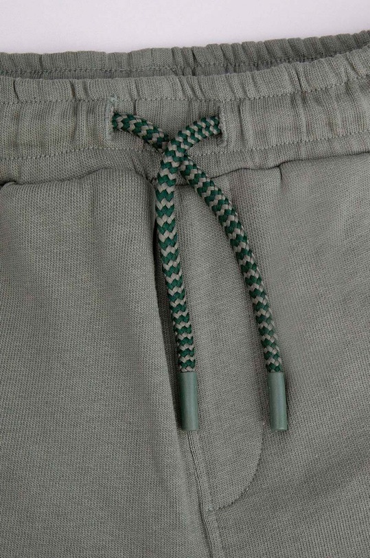 CHLAPEC Dětské bavlněné tepláky Coccodrillo WC4120106NAK zelená