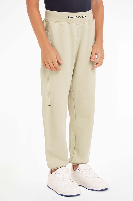 Calvin Klein Jeans pantaloni de trening pentru copii tricotaj bej IB0IB02081.PPYH