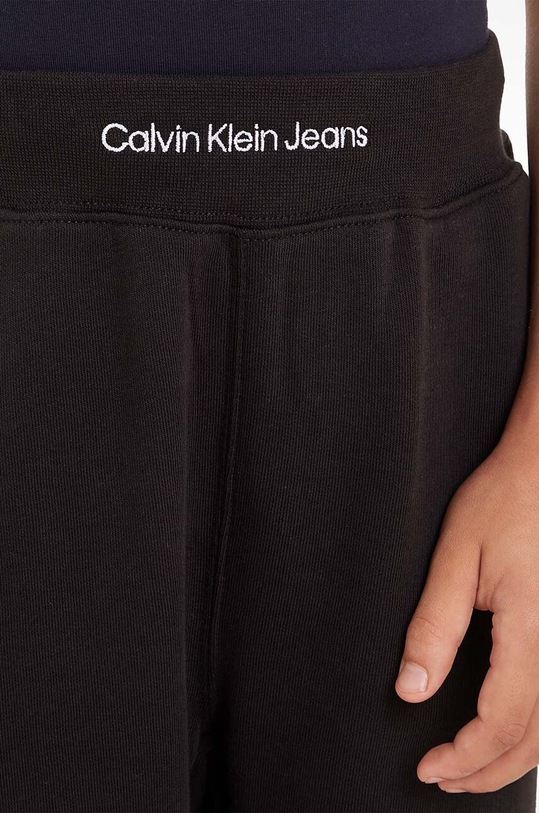 Calvin Klein Jeans spodnie dresowe dziecięce IB0IB02081.PPYH czarny