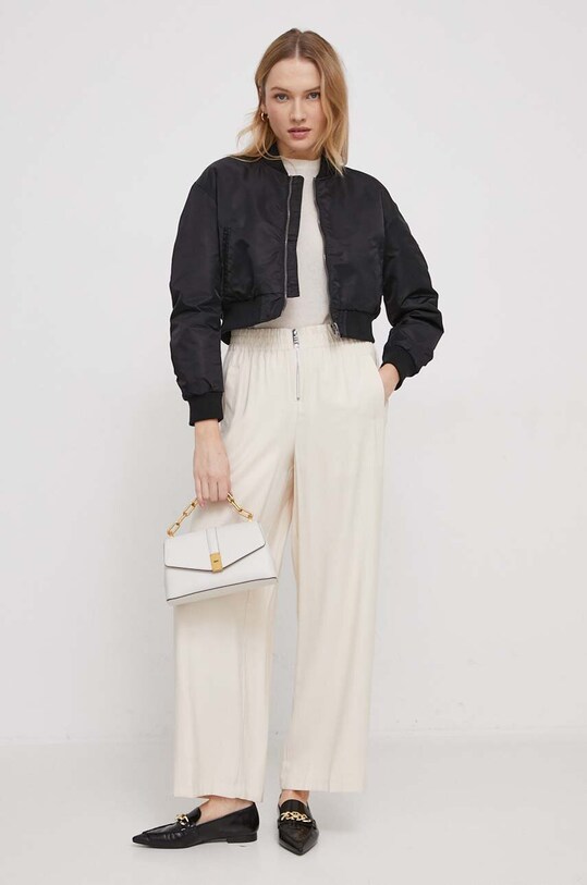 Штани Dkny P3KK8U87 бежевий SS24