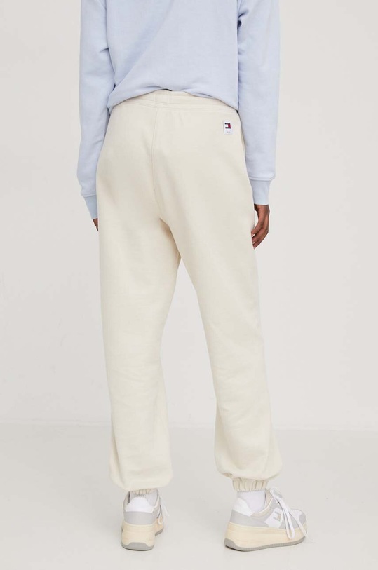 Odzież Tommy Jeans spodnie dresowe bawełniane DW0DW17309 beżowy