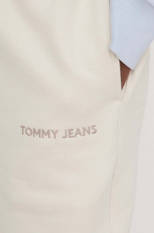 Tommy Jeans spodnie dresowe bawełniane beżowy DW0DW17309