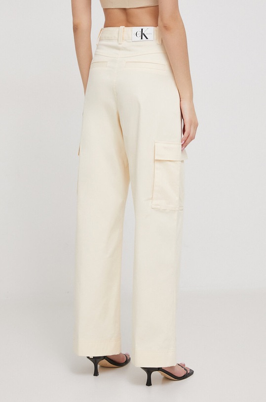 Odzież Calvin Klein Jeans spodnie J20J222607 beżowy