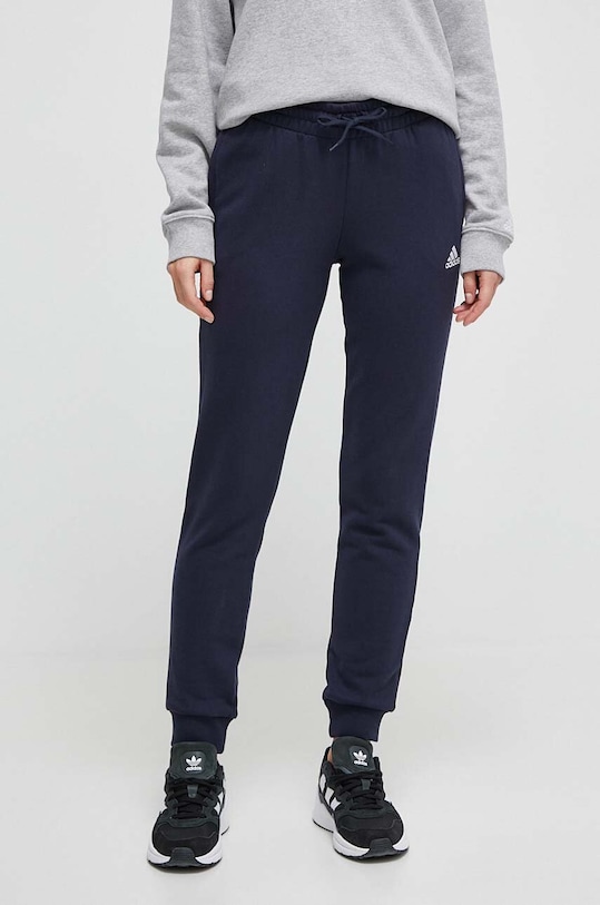 Bavlněné tepláky adidas pletenina námořnická modř IC6869