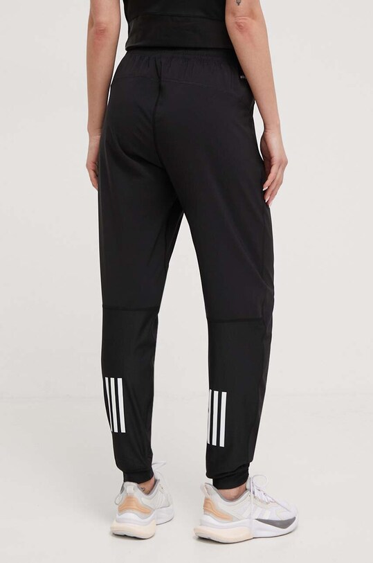 Odzież adidas Performance spodnie do biegania Own the Run IK7444 czarny