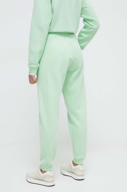 Odzież adidas spodnie dresowe IW1287 zielony