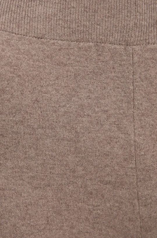 United Colors of Benetton spodnie dresowe z domieszką wełny beżowy 1035DF00F