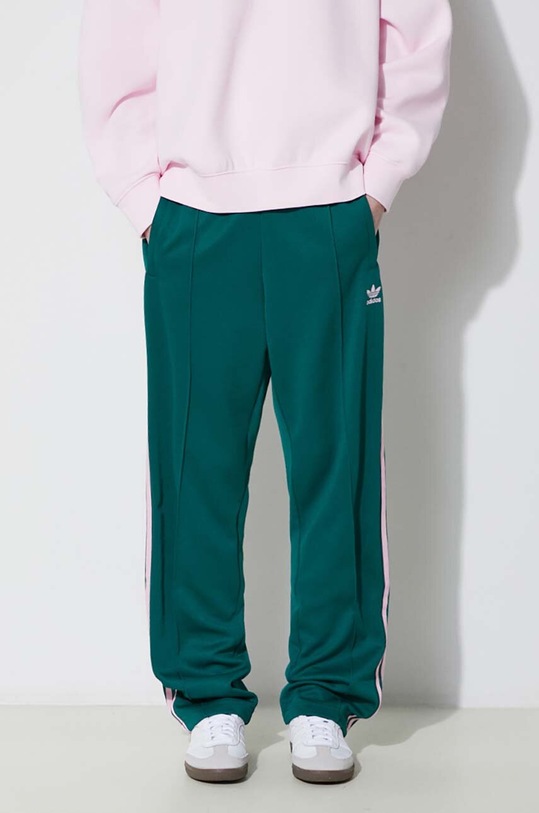 Спортен панталон adidas Originals Adicolor Classics SST Loose зелен IM9818