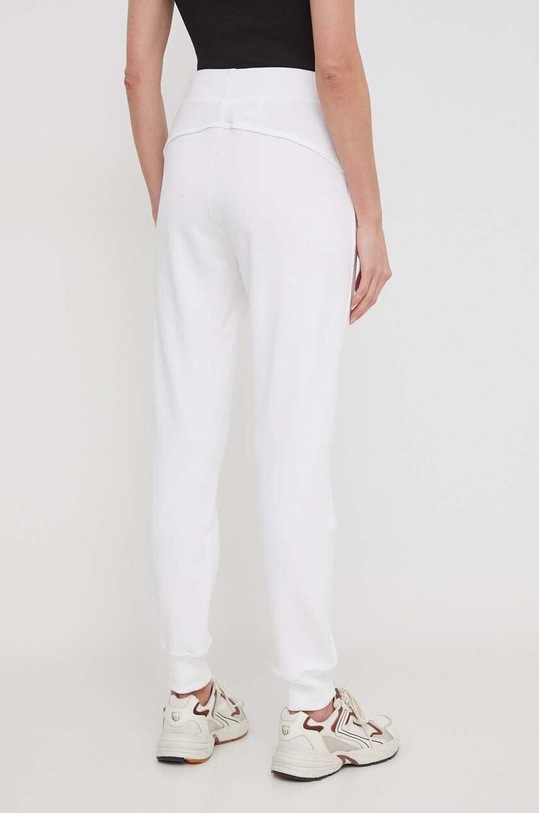 Oblečenie Bavlnené tepláky United Colors of Benetton 3J68DF010 biela