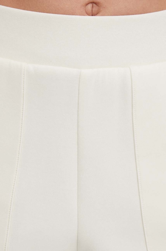 Sisley spodnie dresowe beżowy 4YL9LF04J