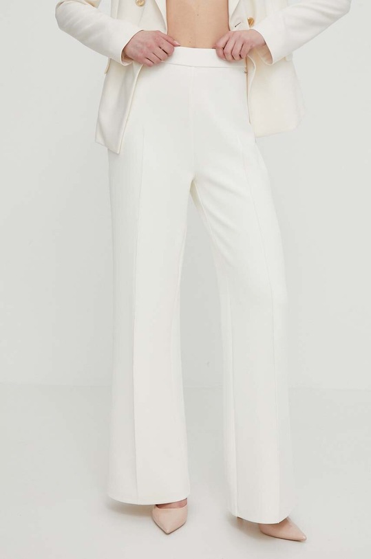 Calvin Klein spodnie z elastanem beżowy K20K207067
