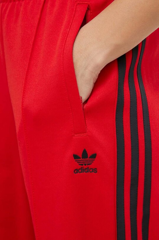 Tepláky adidas Originals červená IM9809