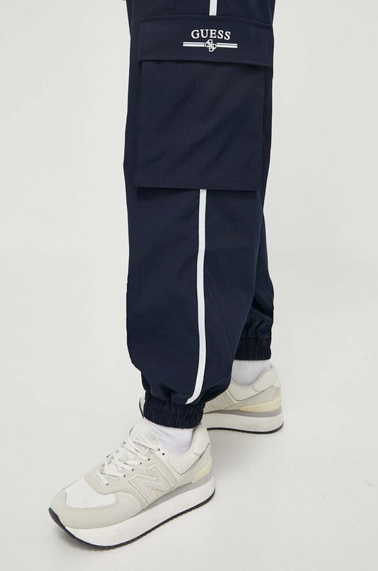 Donji dio trenirke Guess ARLETH mornarsko plava V4GB01.WG2Q0
