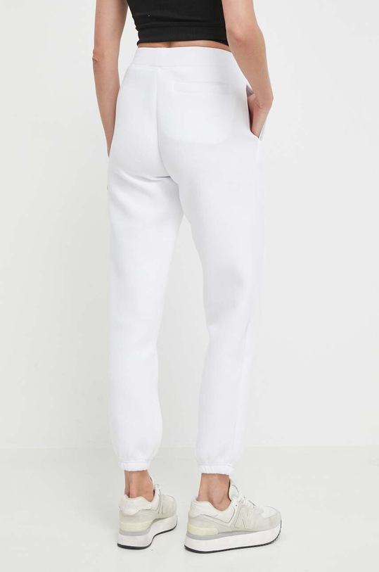 Odzież Guess spodnie dresowe KIARA V4GB14.FL04P biały