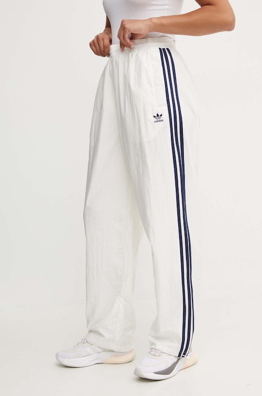 Спортивні штани adidas Originals тканина бежевий IS2354