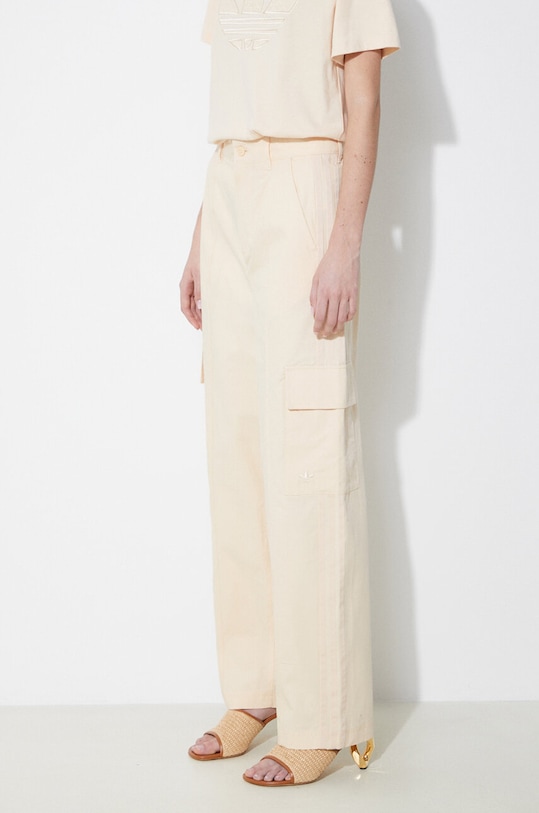 adidas Originals spodnie bawełniane beżowy IU2695