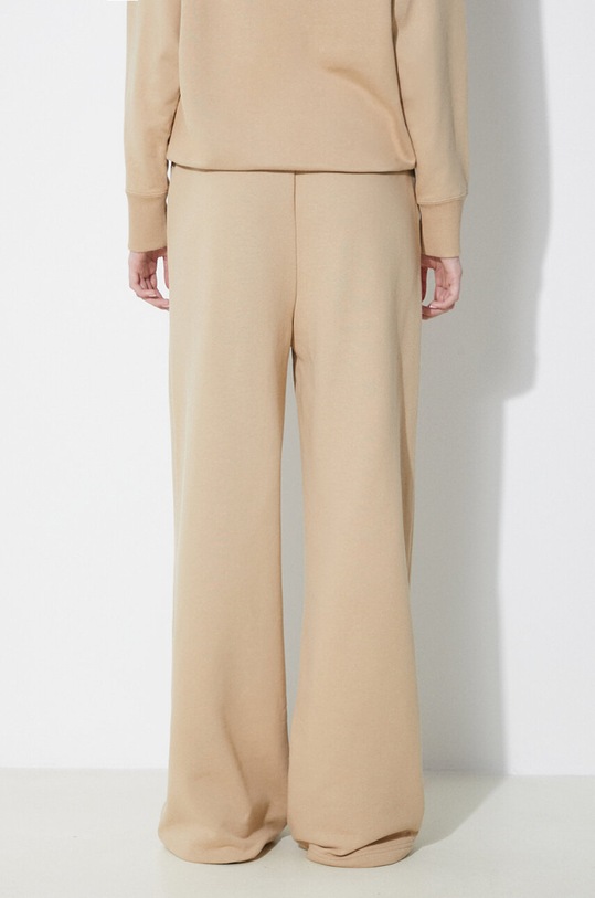 Odjeća Pamučni donji dio trenirke Puma BETTER CLASSIC 624235 bež