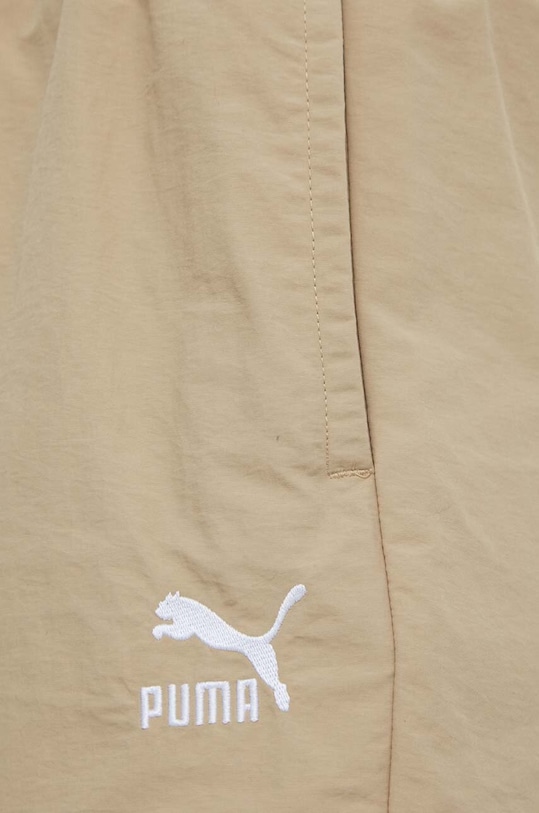 Puma spodnie dresowe beżowy 624245