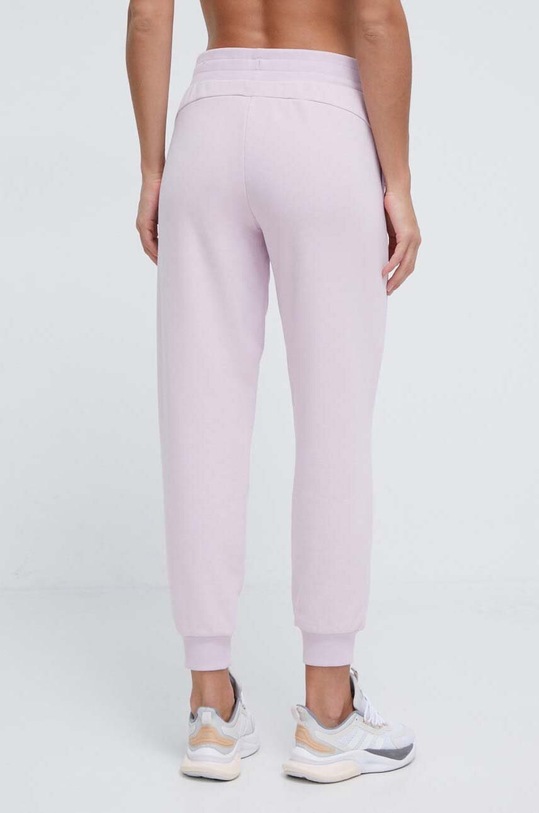 Odzież Puma spodnie dresowe 677895 fioletowy