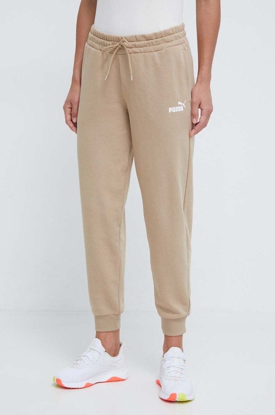 Puma spodnie dresowe dzianina beżowy 678744