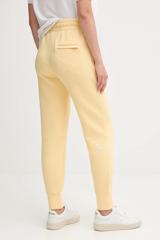 Oblečenie Tepláky Lacoste XF0343 žltá