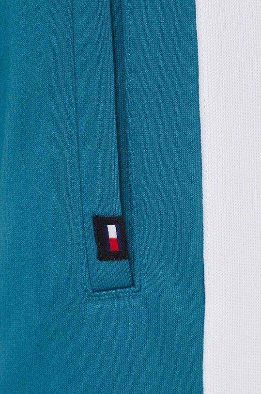 Tepláky Tommy Jeans tyrkysová DW0DW17964