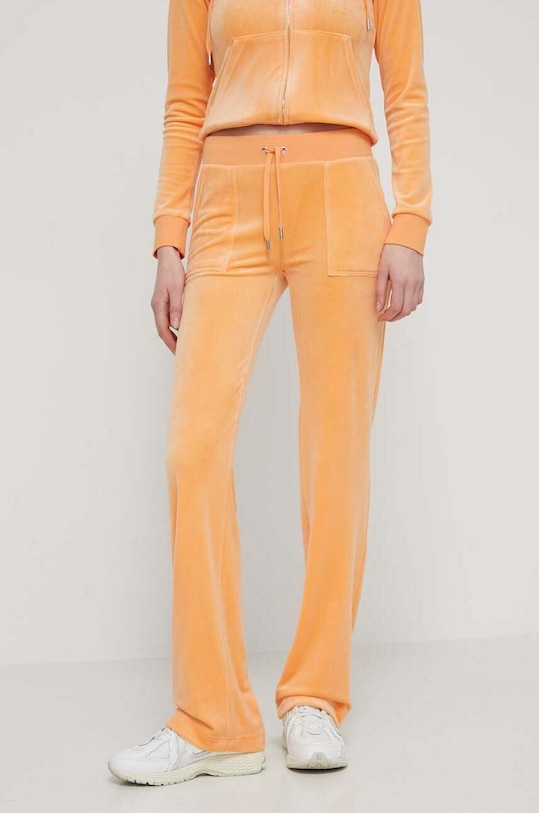 Juicy Couture spodnie dresowe welurowe aplikacja pomarańczowy JCAP180.610