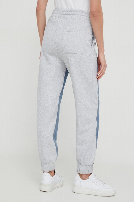 Odzież Desigual spodnie x Disney JOGGER 24SWDD68 szary