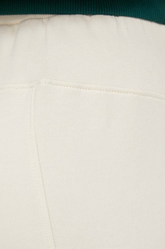 Desigual spodnie dresowe bawełniane JANE beżowy 24SWPK05