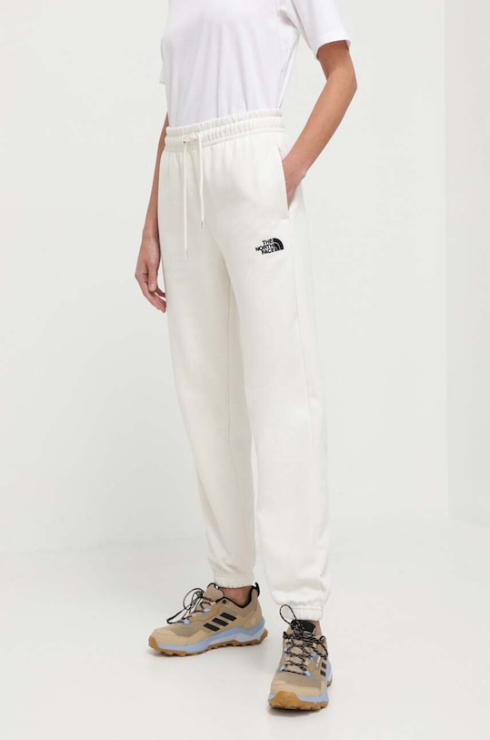 The North Face spodnie dresowe dzianina beżowy NF0A7ZJFQLI1