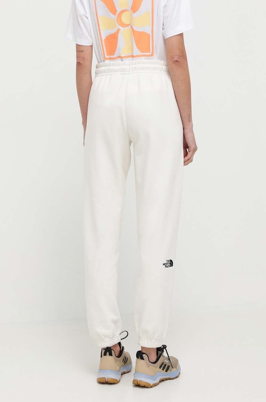 Odzież The North Face spodnie dresowe NF0A7ZJFQLI1 beżowy