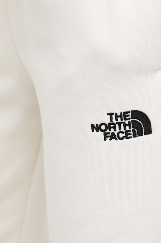 The North Face spodnie dresowe beżowy NF0A7ZJFQLI1
