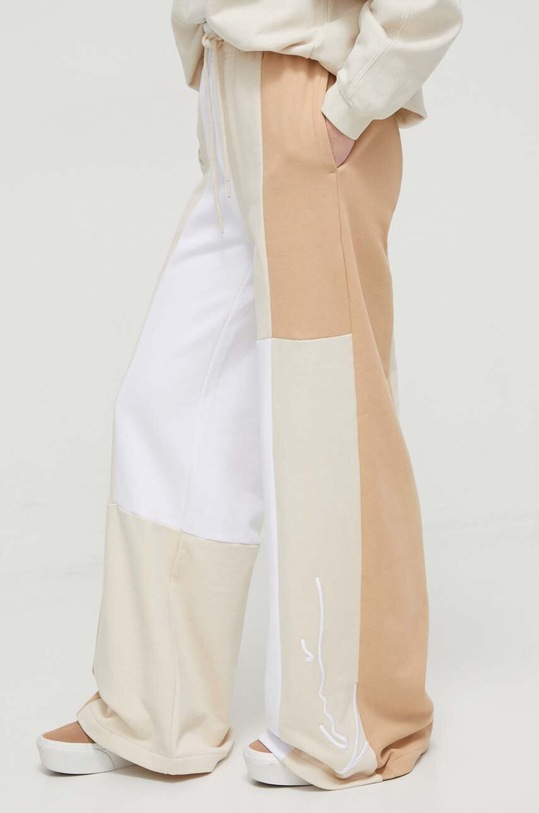 Odzież Karl Kani spodnie dresowe bawełniane 6102070 beżowy