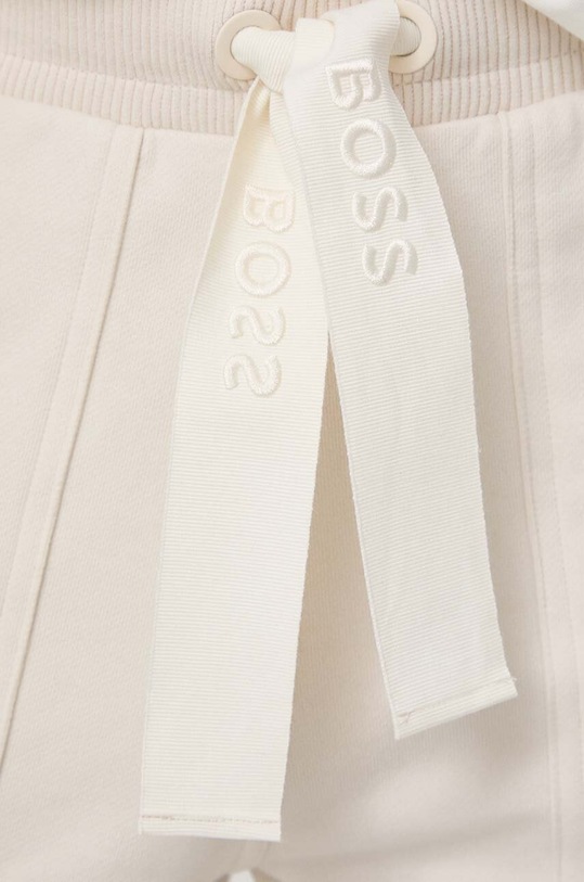 BOSS Orange spodnie dresowe beżowy 50517974