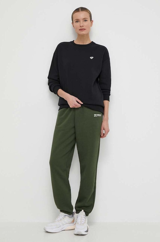 New Balance spodnie dresowe WP33513KOU WP33513KOU zielony SS24