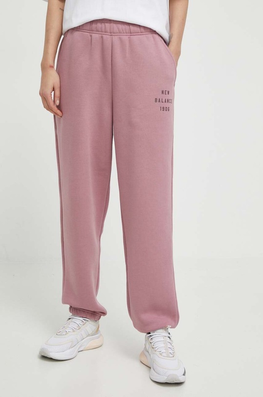 New Balance pantaloni de trening tricotaj roz WP41508RSE