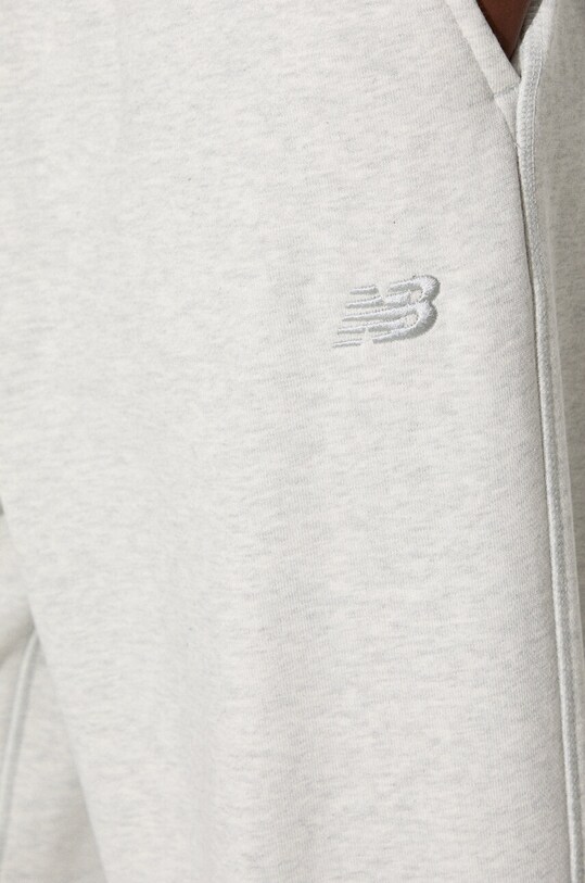 Bavlnené tepláky New Balance WP41513AHH sivá