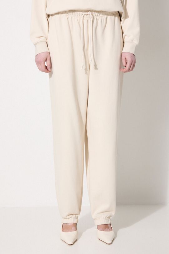 Βαμβακερό παντελόνι New Balance βαμβάκι μπεζ WP41513LIN