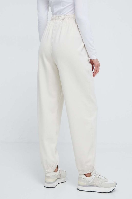 Îmbrăcăminte New Balance pantaloni de trening din bumbac WP41513LIN bej