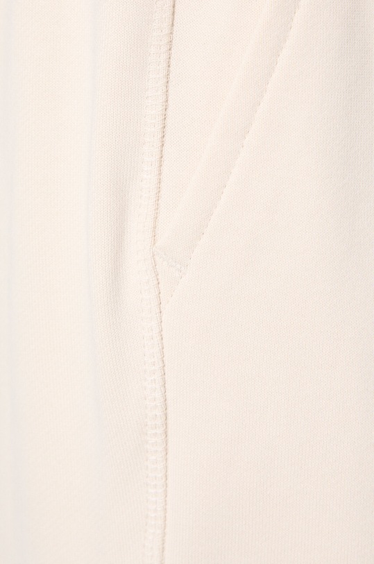 Βαμβακερό παντελόνι New Balance WP41513LIN μπεζ