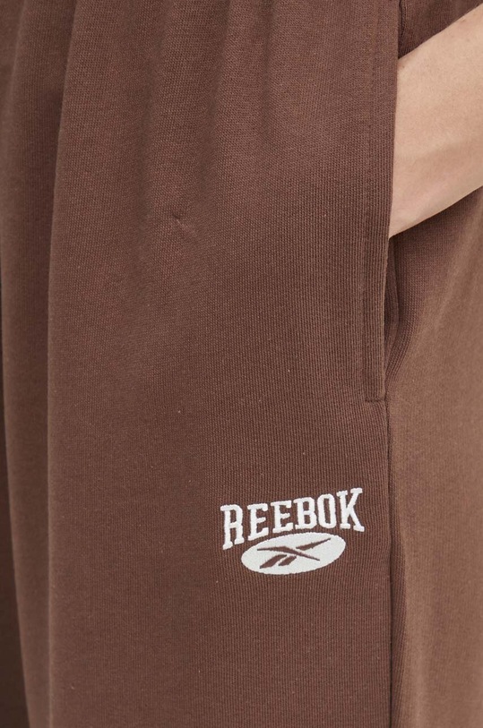 Bavlněné tepláky Reebok Classic Archive Essentials hnědá 100076213